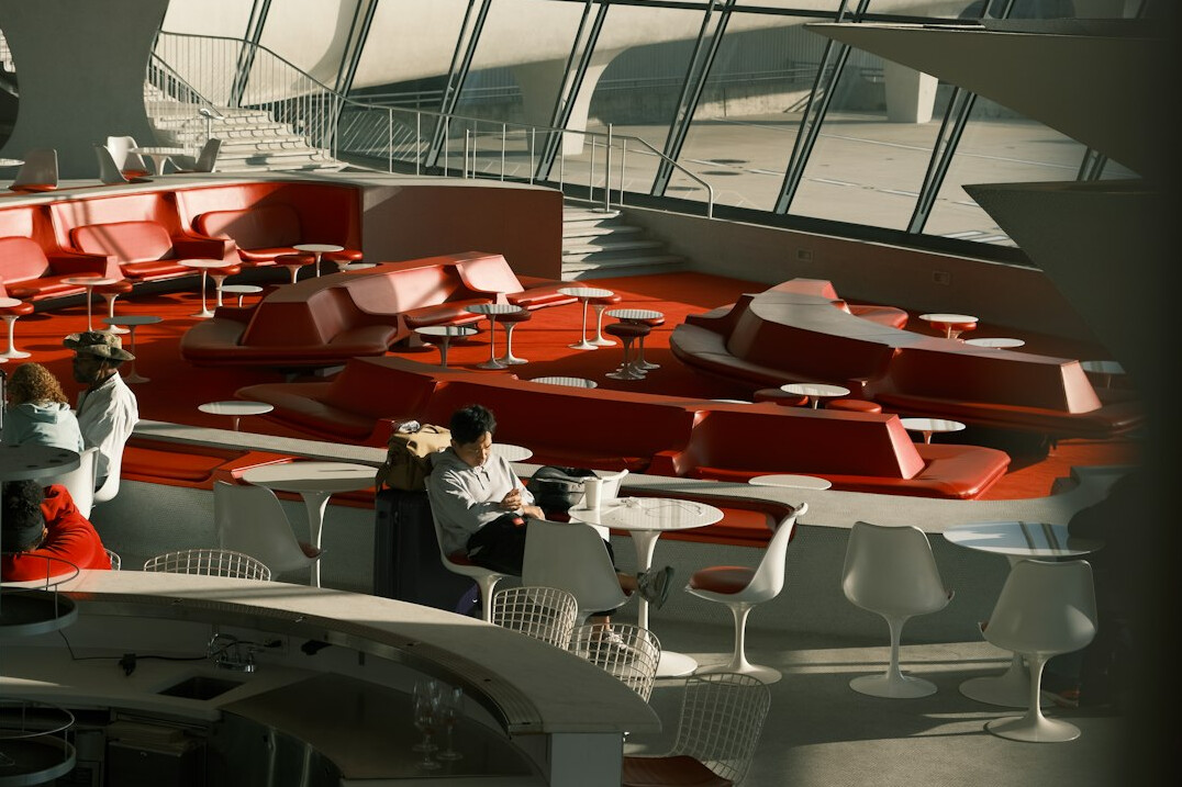 Colleagues taking a relaxed break in a bright lounge area